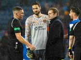 Hearts manager Robbie Neilson confronts referee John Beaton at full time after the 1-0 defeat to Rangers at Ibrox. (Photo by Alan Harvey / SNS Group)