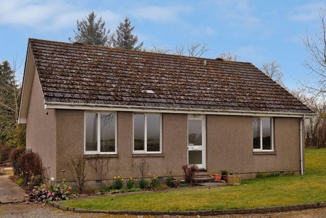 Kirk Cottage is a three-bedroom detached bungalow with gardens and a paddock located on the outskirts of the village of Kirkton of Skene, eight miles outside Aberdeen. The peaceful home could be yours for offers over £275,000.