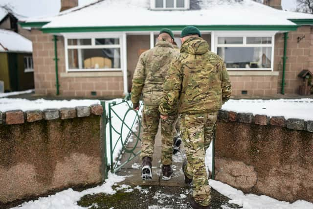 Marines from 45 Commando conducting welfare checks in Lumphanan