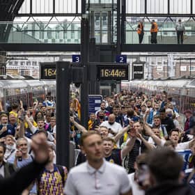 Scotland fans arrive at King's Cross Station on Thursday ahead of the England match.