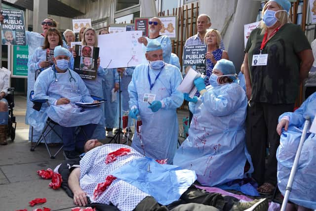 Protesters outside the Scottish Parliament in Edinburgh are asking for a public inquiry into the care given to patients by "disgraced surgeon" Professor Sam Eljamel. Picture: Andrew Milligan/PA Wire
