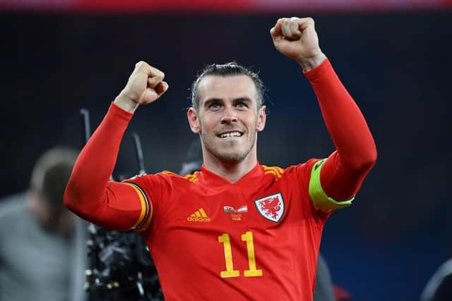 Gareth Bale of Wales celebrates following the 2022 FIFA World Cup Qualifier knockout round play-off match between Wales and Austria at Cardiff City Stadium on March 24, 2022 in Cardiff, Wales. (Photo by Dan Mullan/Getty Images)