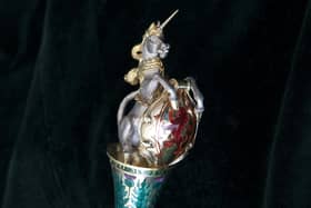 A unicorn - which was adopted as Scotland's national animal given its symbolism of strength, power and purity - sits upon a 19th Century ceremonial rod. PIC. NMS.