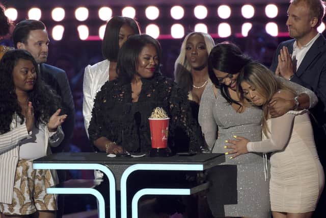 Participants and crew from "Surviving R. Kelly" accept the award for best documentary at the MTV Movie and TV Awards on June 15, 2019, in Santa Monica, California. (Image credit: Chris Pizzello/Invision/AP, File)