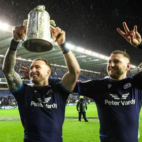 Stuart Hogg and Finn Russell with the Calcutta Cup following victory over England in 2022.