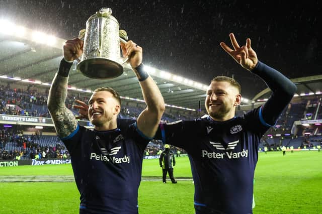 Stuart Hogg and Finn Russell with the Calcutta Cup following victory over England in 2022.