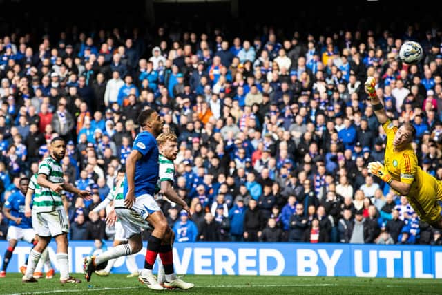 Rangers' Rabbi Matondo curls the ball beyond Celtic goalkeeper Joe Hart to make it 3-3 at Ibrox.