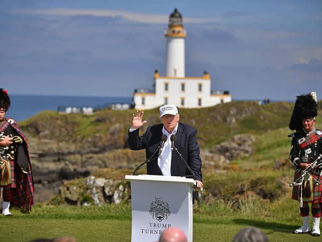 Donald Trump holds a press conference on the ninth tee at the official opening of the Trump Turnberry resort in June, 2016. Picture: Jeff J Mitchell/Getty Images.
