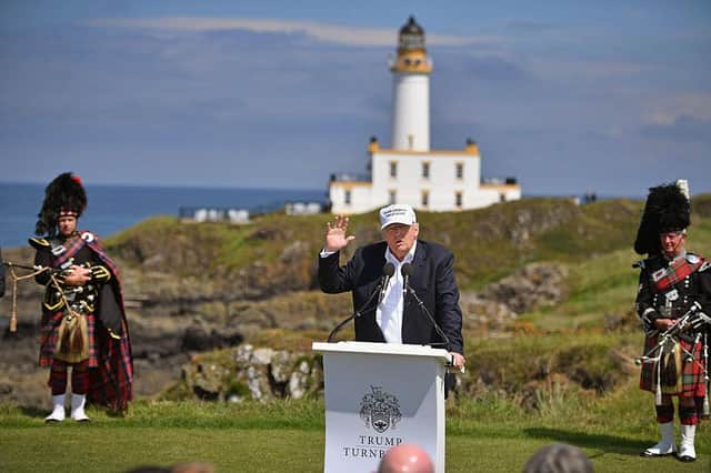 Donald Trump holds a press conference on the ninth tee at the official opening of the Trump Turnberry resort in June, 2016. Picture: Jeff J Mitchell/Getty Images.
