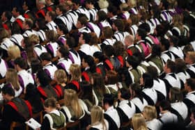 Graduates from Edinburgh University celebrate after a graduation ceremony at the McEwan Hall in the centre of Edinburgh. 
