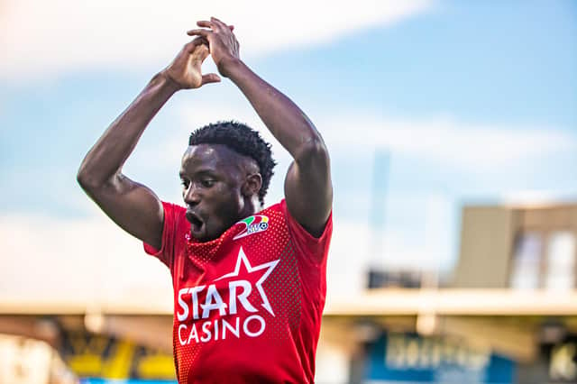 Fashion Sakala celebrates one of his two goals in his last match for Oostende against Mechelen last week ahead of his summer move to Rangers. (Photo by KURT DESPLENTER/BELGA MAG/AFP via Getty Images)