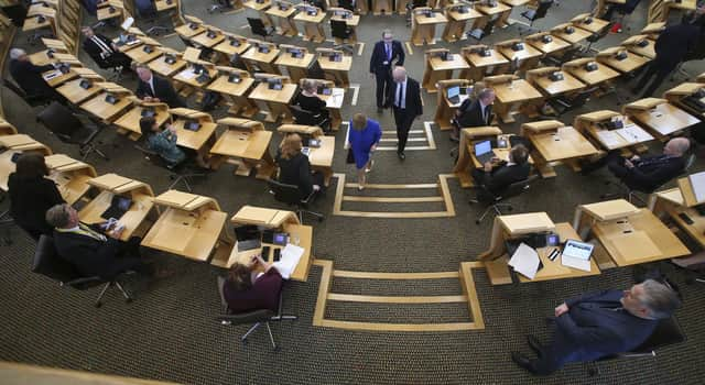 First Minister Nicola Sturgeon at the Scottish Parliament Holyrood Edinburgh outlines new restrictions designed to limit the spread of coronavirus in Scotland. Picture: Fraser Bremner