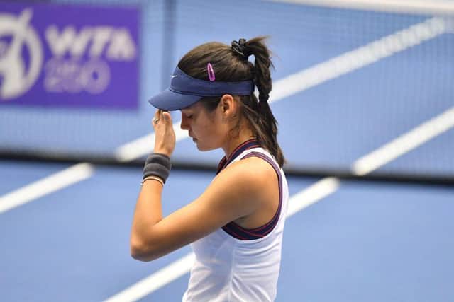 Britain's Emma Raducanu reacts during the women's singles match of the WTA Upper Austria Ladies tennis tournament against  China's Wang Xinyu in Linz, on November 9, 2021. (Photo by BARBARA GINDL/APA/AFP via Getty Images)
