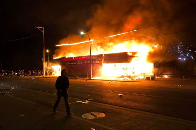 Protestors in Minneapolis have responded with anger following the death of George Floyd in police custody (Getty Images)