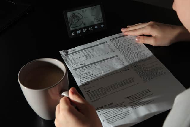 A smart meter next to an energy bill. Picture: Peter Byrne/PA Wire