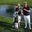 Adrian Meronk celebrates with his caddie, Eskbank man Stuart Beck, after the Pole's win in the DS Automobiles Italian Open at Marco Simone Golf Club. Picture: Andrew Redington/Getty Images.