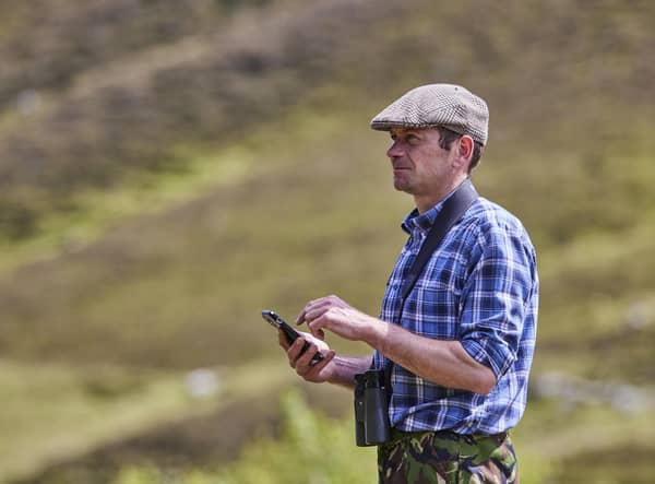 Arthur Fernie, Head Gamekeeper on Mar Estate monitoring waders. (Photo Ed Smith)