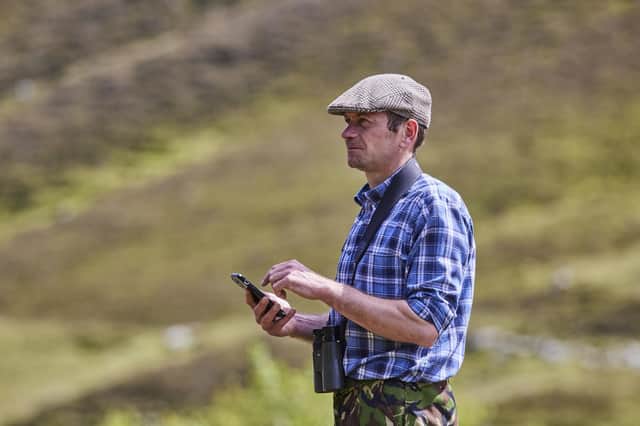 Arthur Fernie, Head Gamekeeper on Mar Estate monitoring waders. (Photo Ed Smith)