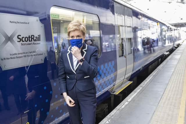 First Minister Nicola Sturgeon unveils a specially branded train to mark the Scottish Government's takeover of ScotRail on April 1 (Picture: Robert Perry/PA Wire)