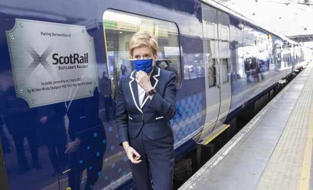 First Minister Nicola Sturgeon unveils a specially branded train to mark the Scottish Government's takeover of ScotRail on April 1 (Picture: Robert Perry/PA Wire)