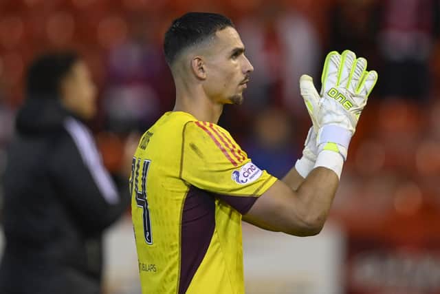 Aberdeen goalkeeper Kelle Roos applauds the home fans after Thursday night's defeat to BK Hacken in the Europa League play-off round (Photo by Rob Casey / SNS Group)