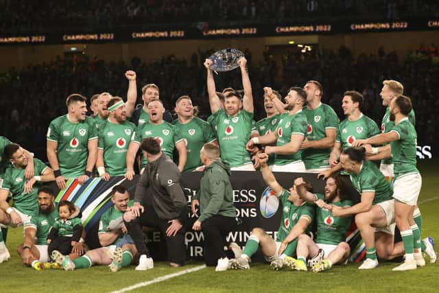 Ireland's players celebrate with the Triple Crown after beating all the Home Nations teams.