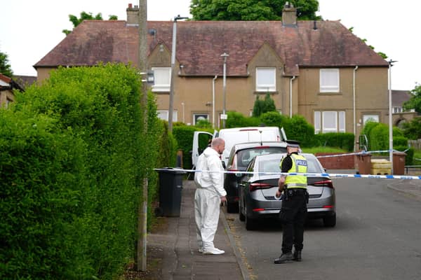 The scene in Fernieside Crescent, Edinburgh, following the death of a 78-year-old woman. Photo: Jane Barlow/PA Wire