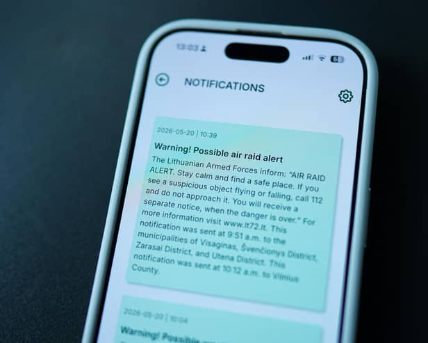 This photograph shows a mobile phone that displays a warning of a possible air raid, in Vilnius on May 20, 2026.