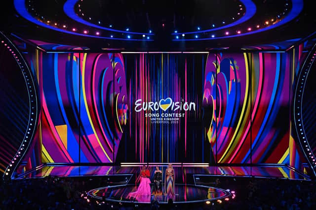 Eurovision 2023 hosts Alesha Dixon, Ukrainian singer Julia Sanina and English actress Hannah Waddingham present the first semi-final at the M&S Bank Arena in Liverpool. Photo: Paul Ellis/AFP via Getty Images