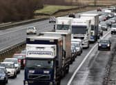 Lorries in Scotland are legally required to travel 10mph slower on most main roads than those in England (Picture: Jeff J Mitchell/Getty Images)