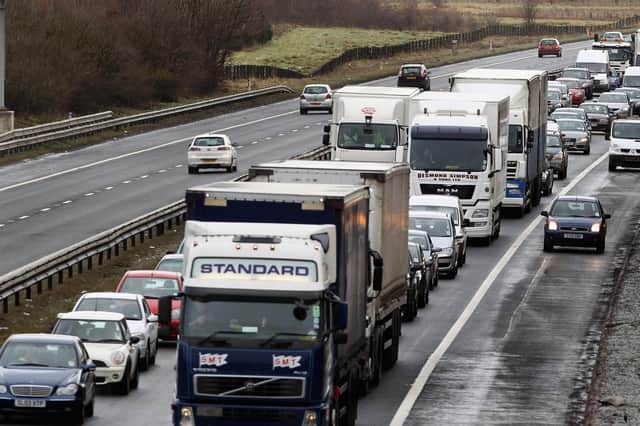 Lorries in Scotland are legally required to travel 10mph slower on most main roads than those in England (Picture: Jeff J Mitchell/Getty Images)
