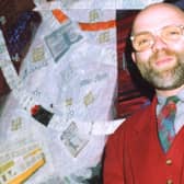 Malcolm Lochhead with his November 1990 Keeping Glasgow in Stitches banner