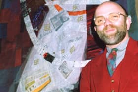Malcolm Lochhead with his November 1990 Keeping Glasgow in Stitches banner