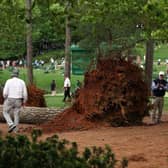 Course officials look over fallen trees on the 17th hole during the second round of the 2023 Masters Tournament at Augusta National Golf Club. Picture: Patrick Smith/Getty Images.