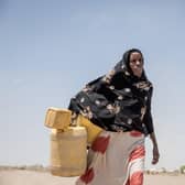 A villager in Kenya fetching water; Somalia, Kenya and Ethiopia are currently suffering from the worst drought in 40 years