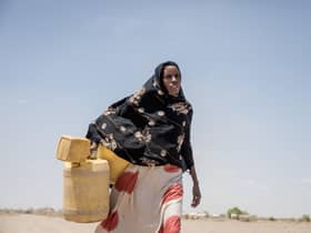A villager in Kenya fetching water; Somalia, Kenya and Ethiopia are currently suffering from the worst drought in 40 years