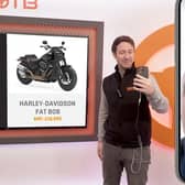 Watch the moment a Scottish petrol head wins a Harley-Davidson with a 70p ticket