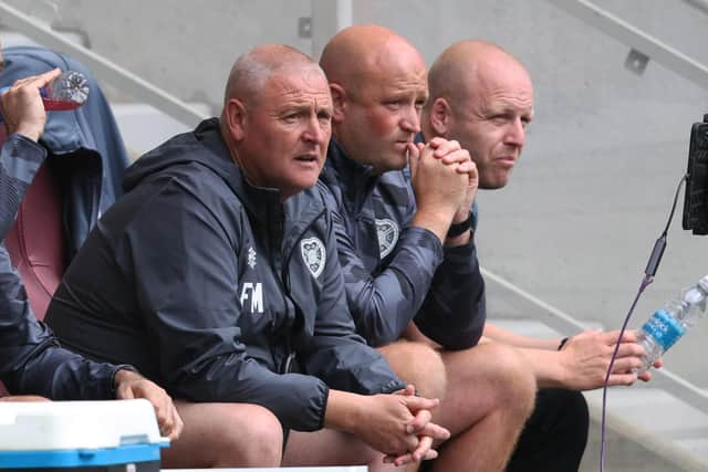 Hearts coaches Frankie McAvoy, Gordon Forrest and Steven Naismith during the pre-season friendly against Leeds United at Tynecastle. Photo by Ross MacDonald / SNS Group