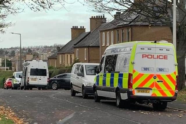 A man has been arrested near Broomhouse Road.