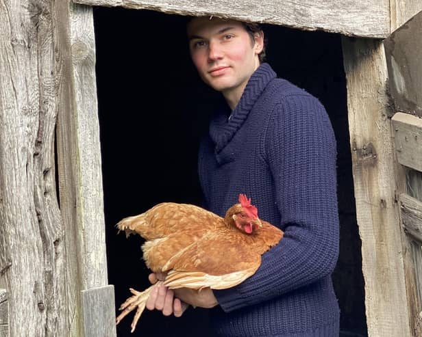 Arthur Parkinson with one of his hens
