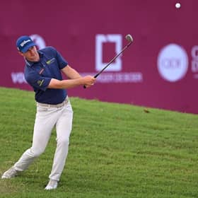 David Law chips onto the 18th green during his second round in the Commercial Bank Qatar Masters at Doha Golf Club. Picture: Ross Kinnaird/Getty Images.