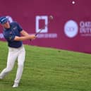 David Law chips onto the 18th green during his second round in the Commercial Bank Qatar Masters at Doha Golf Club. Picture: Ross Kinnaird/Getty Images.