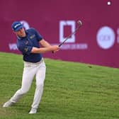 David Law chips onto the 18th green during his second round in the Commercial Bank Qatar Masters at Doha Golf Club. Picture: Ross Kinnaird/Getty Images.
