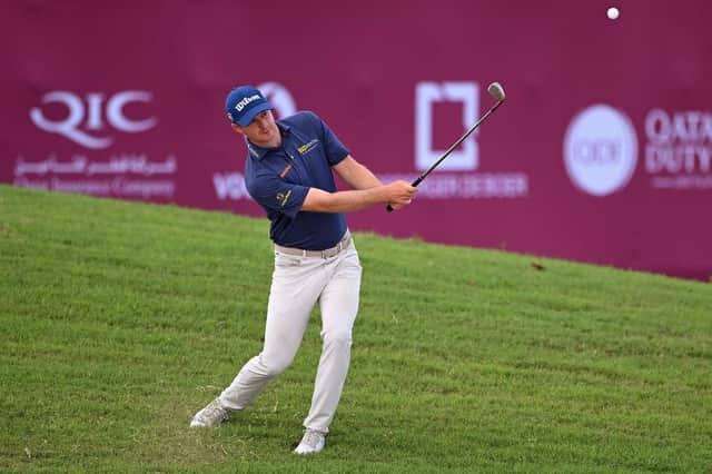 David Law chips onto the 18th green during his second round in the Commercial Bank Qatar Masters at Doha Golf Club. Picture: Ross Kinnaird/Getty Images.