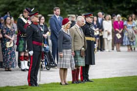 His Majesty The King, accompanied by Her Majesty The Queen, presented the New Ballater Colour to the Royal Guard. (Photo: Mark Owens)