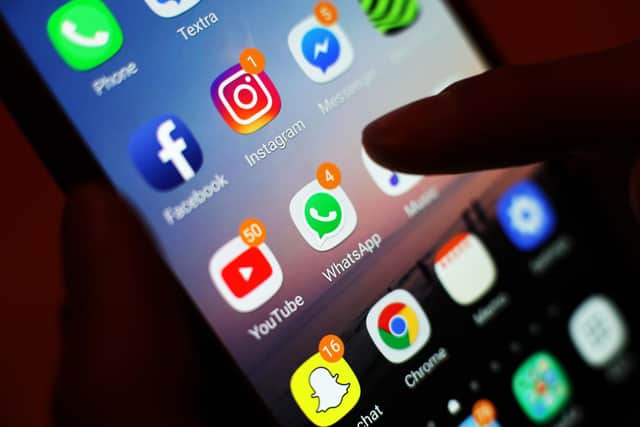 Social media apps, including Facebook, Instagram, YouTube and WhatsApp, displayed on a mobile phone screen. Picture: Yui Mok/PA Wire