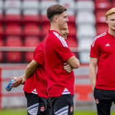 Jim Goodwin has defended Aberdeen signing Liam Scales. (Photo by Roddy Scott / SNS Group)