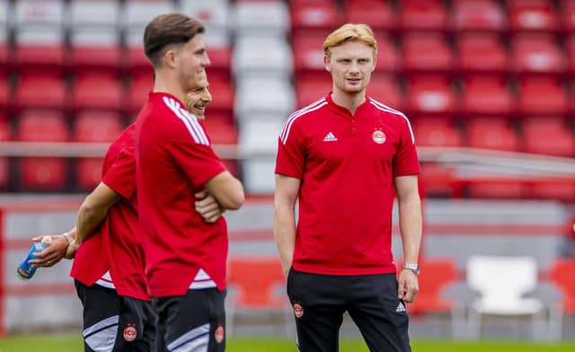 Jim Goodwin has defended Aberdeen signing Liam Scales. (Photo by Roddy Scott / SNS Group)