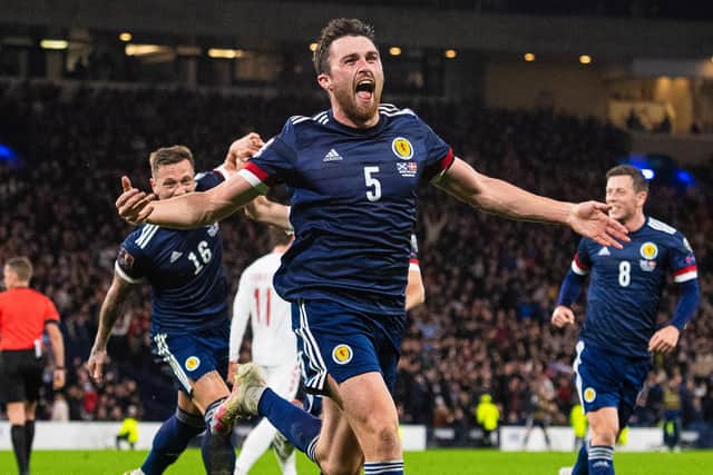 Scotland’s John Souttar celebrates after scoring to make it 1-0 against Denmark. (Photo by Ross MacDonald / SNS Group)