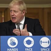 Boris Johnson during Saturday's media briefing in Downing Street on the return of lockdown in England